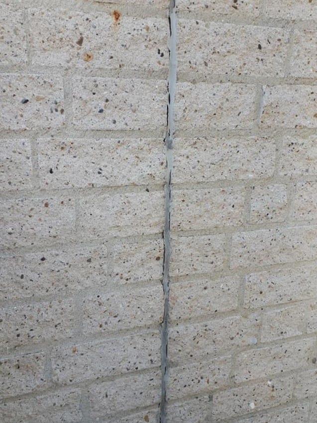 Broken seal on concrete wall joint