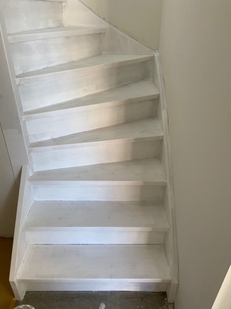 Stairs with a primer coat of paint